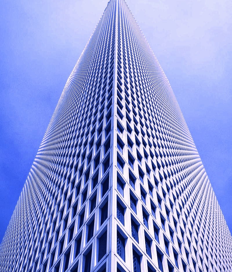 Looking up at a building facade, structure and systems, CRM & AI Automation at Devodin